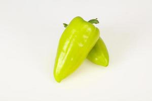 Sweet green bell pepper isolated on white photo