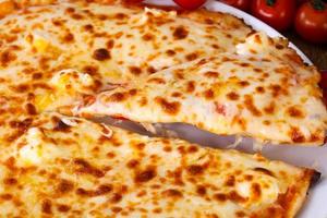 Four cheese pizza photo
