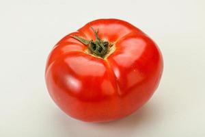 Ripe big juicy red tomato photo