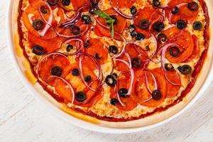 Pizza with salami photo