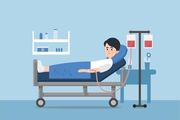 Hospitalization of the patient. A sick person is in a medical bed on a drip.