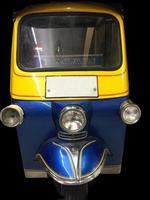 front view of an auto rickshaw called a tuk-tuk used commonly as a form of transport in South East Asia photo