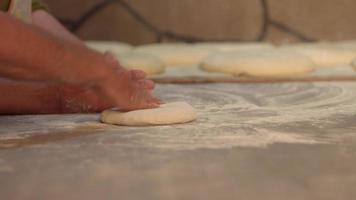 Bread dough preparation. Bread making with traditional methods, village bread. video