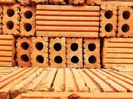 Closeup Shot of old brick house construction,Red brick wall texture background. photo