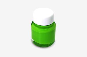 botella de pintura de acuarela verde aislada sobre fondo blanco con trazado de recorte. foto
