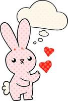 cute cartoon rabbit with love hearts and thought bubble in comic book style vector