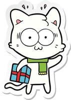 sticker of a cartoon surprised cat with christmas present vector