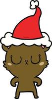 peaceful line drawing of a bear wearing santa hat vector