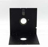 Vintage Floppy Disk 5.25 inch. Retro storage technology on white background. photo
