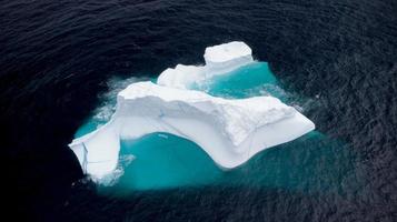Aerial View of the complete iceberg seen under water and outside water photo