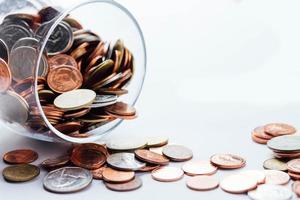 Thai Baht Coins money in glass bottles photo