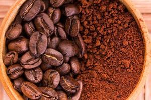 Roasted coffee beans and powder background photo