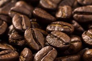 Roasted brown coffee beans background photo