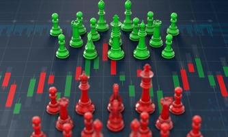 Chess on candle stick graph, planning buy sell on stock market photo
