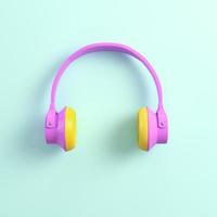 auriculares rosas sobre fondo brillante foto