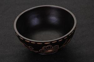 Empty wooden bowl photo