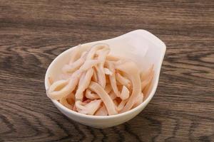 Marinated squid slices in the bowl photo