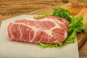 Raw pork meat neck steack photo