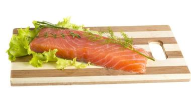 Salmon fillet garnished photo