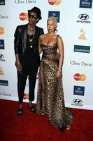 LOS ANGELES, FEB 11 - Wiz Khalifa and Amber Rose arrives at the Pre-Grammy Party hosted by Clive Davis at the Beverly Hilton Hotel on February 11, 2012 in Beverly Hills, CA photo