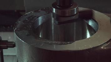 Metal disc, cnc machining. Metal disc processed on cnc machine at factory. Industrial image. video