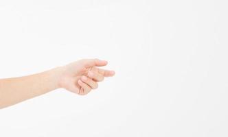 female hand holding invisible items, woman's palm making gesture while showing small amount of something on white isolated background, side view, close-up, cutout, copy space photo