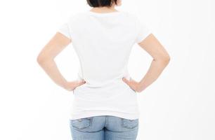 Back view - woman in white t-shirt isolated mock up, copy space, empty tshirt. Girl in t shirt. photo