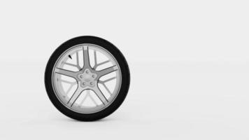 Seamless looping of rubber wheel spins across the screen back and forth on isolated white background. Transportation and traveling industrial concept. Full HD footage video motion graphic