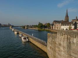 The city of Maastricht at the river Maas in the netherlands photo