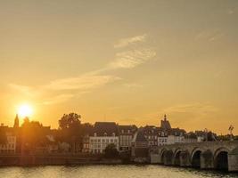 The city of Maastricht at the river Maas in the netherlands photo