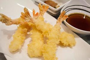 Japanese cuisine, tempura deep fried shrimps with sauce photo