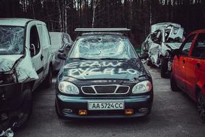 Irpin, Kyiv region, Ukraine - 28 April 2022.  Car graveyard in Irpin, consequences of the invasion of the Russian army in Ukraine. photo