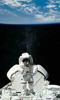Astronaut and spaceship. Elements of this image furnished by NASA. photo