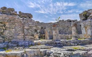 Ancient Tulum ruins Mayan site temple pyramids artifacts seascape Mexico. photo