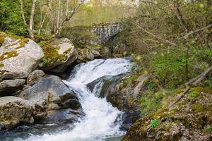 Waterfall at Madriu Perafita Claror Valley in Andorra,UNESCO world heritage site photo