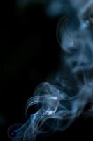 abstract background of smoke or fog on black background photo