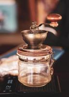 Manual coffee grinder. old coffee grinder photo