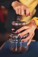 Manual coffee grinder. old coffee grinder photo