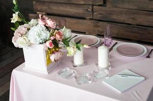 Setting the wedding table for a young couple photo