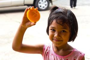 Girl holding candle photo