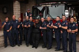 LOS ANGELES, JUN 8 - Cee Lo Green with Sierra Madra Firefighters at the Duracell, Power Those Who Protect Us Event at Sierra Madre Fire Department on June 8, 2011 in Sierra Madre, CA photo