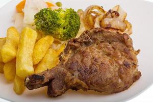 T-bone steak on white background photo