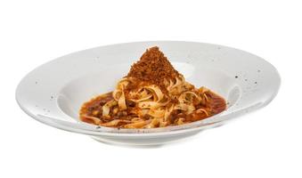 Pasta with tomato sauce basil and grated parmesan photo