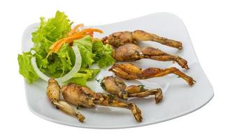 Grilled frog legs photo