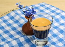 Espresso with spring flower photo