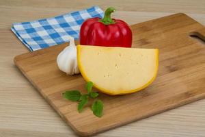 Yellow round cheese photo