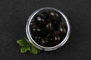 Black olives in the bowl photo