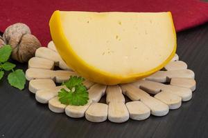 Yellow round cheese photo