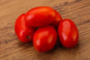 Red bright tasty tomato heap photo