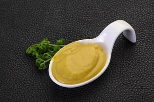 Mustard sauce in the bowl photo